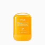 Anua Glow Stick SPF50 sunscreen in its orange twist-up tube