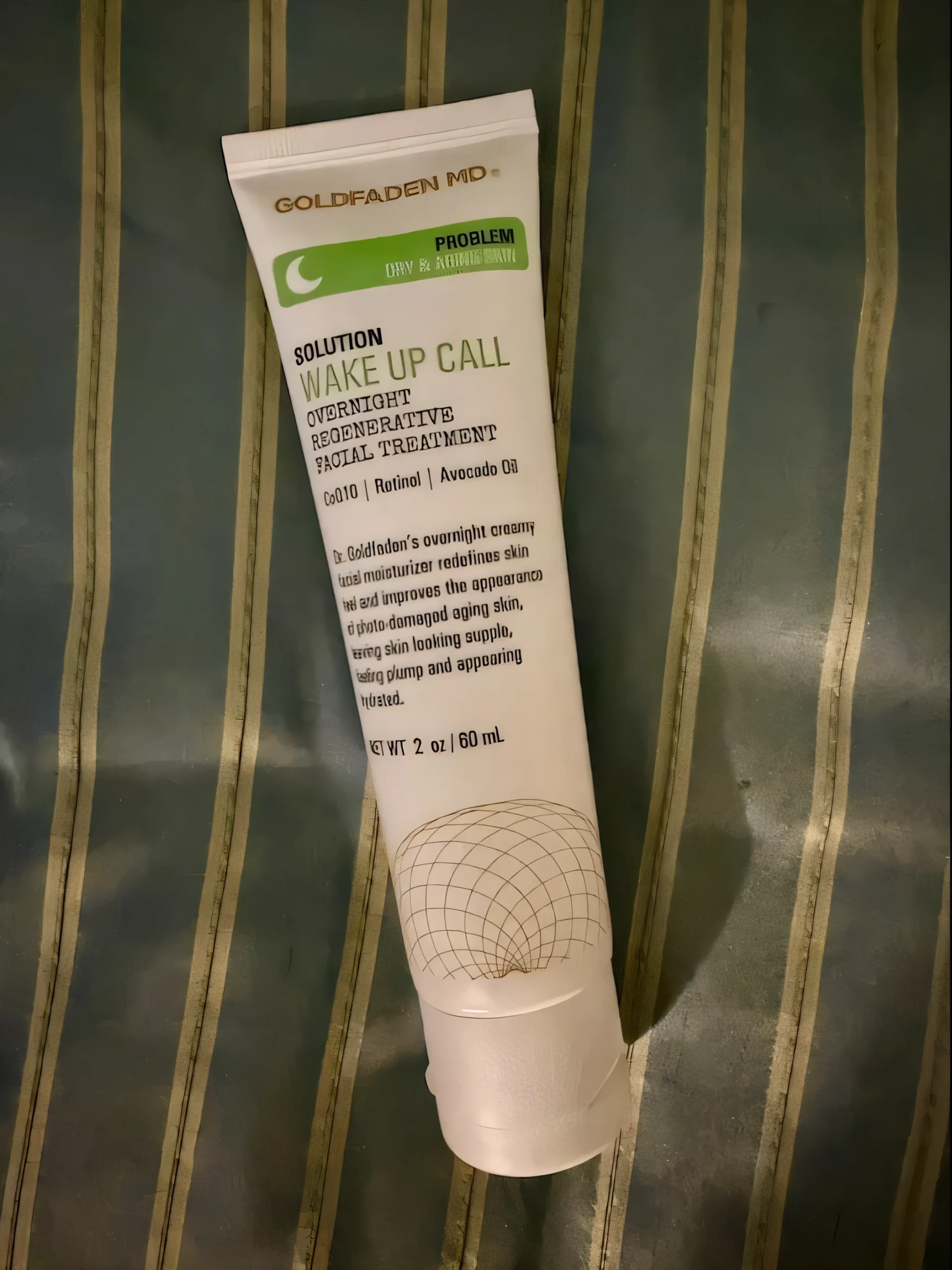 Goldfaden MD Wake Up Call overnight cream tube on bathroom counter
