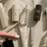 Bathroom shelf with clean beauty skincare products being sorted