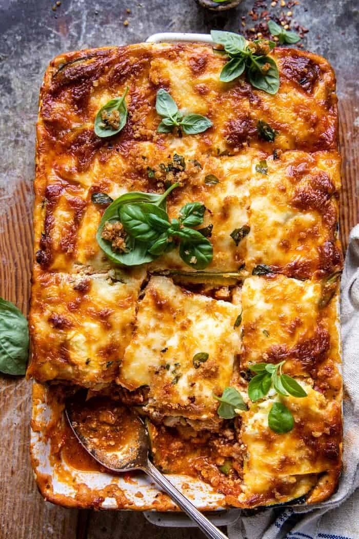 Spicy zucchini ricotta lasagna with oregano breadcrumbs, drizzled with olive oil