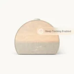 Wellness product grid: body oil, sleep clock, and bath towel arranged on a bright shelf