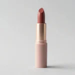 Open Tom Ford matte lipstick standing upright on neutral background