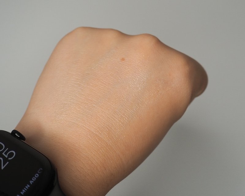 Rich cream texture swatched on forearm skin